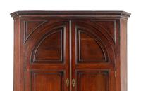 A George II Mahogany Corner Cabinet