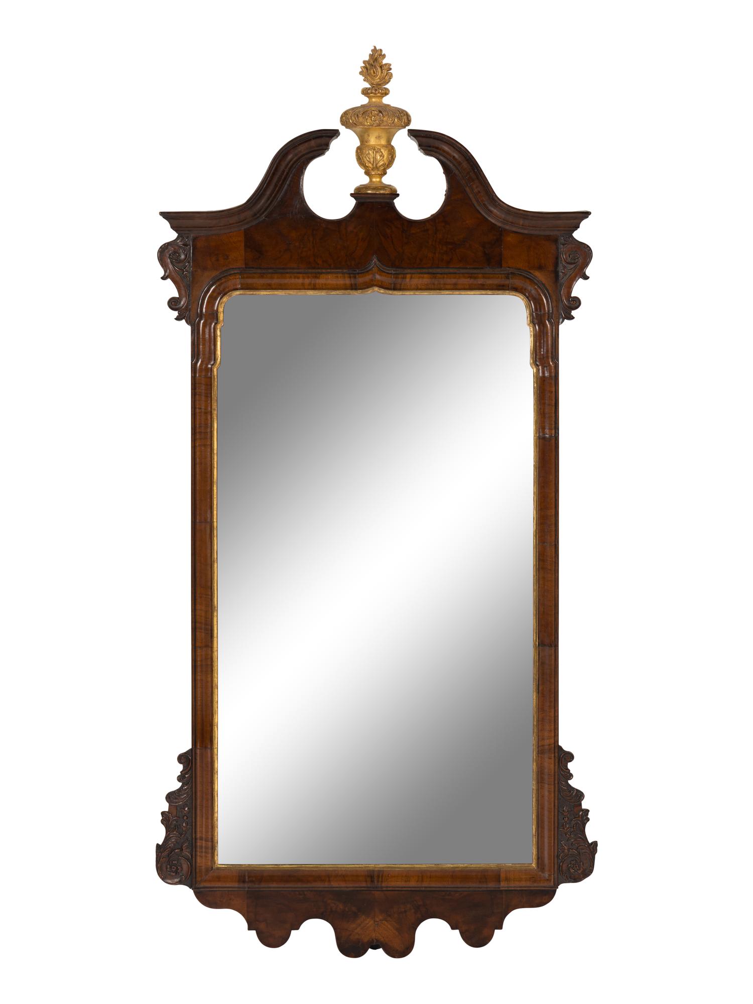 A George I Walnut and Parcel-Gilt Mirror