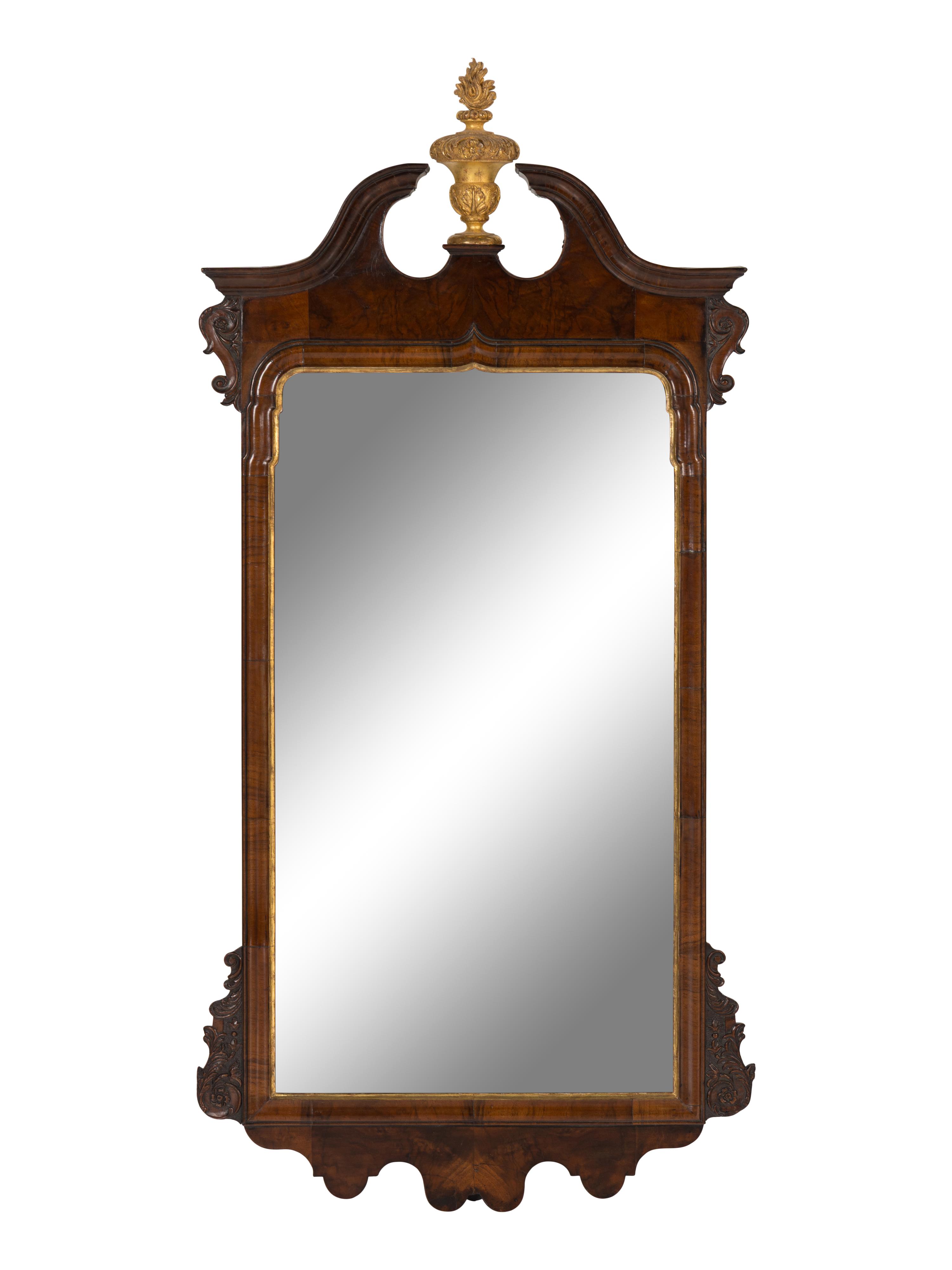 A George I Walnut and Parcel-Gilt Mirror