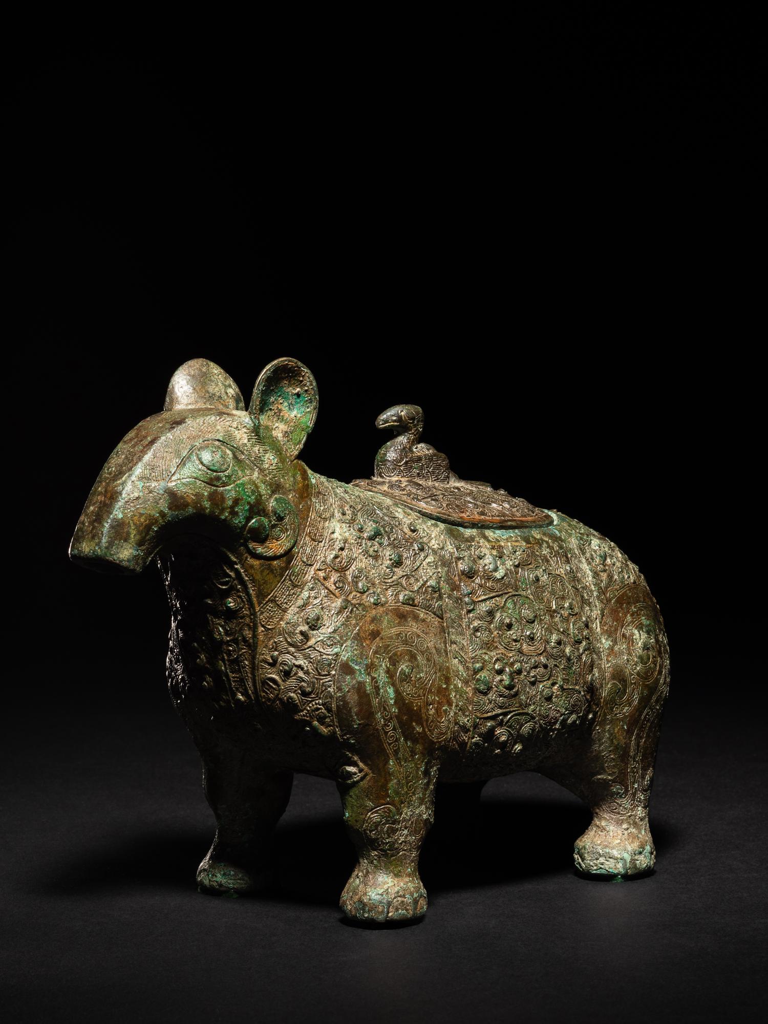 A Chinese Bronze Tapir-Form Covered Vessel