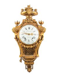 A Louis XVI Style Gilt Bronze Cartel Clock