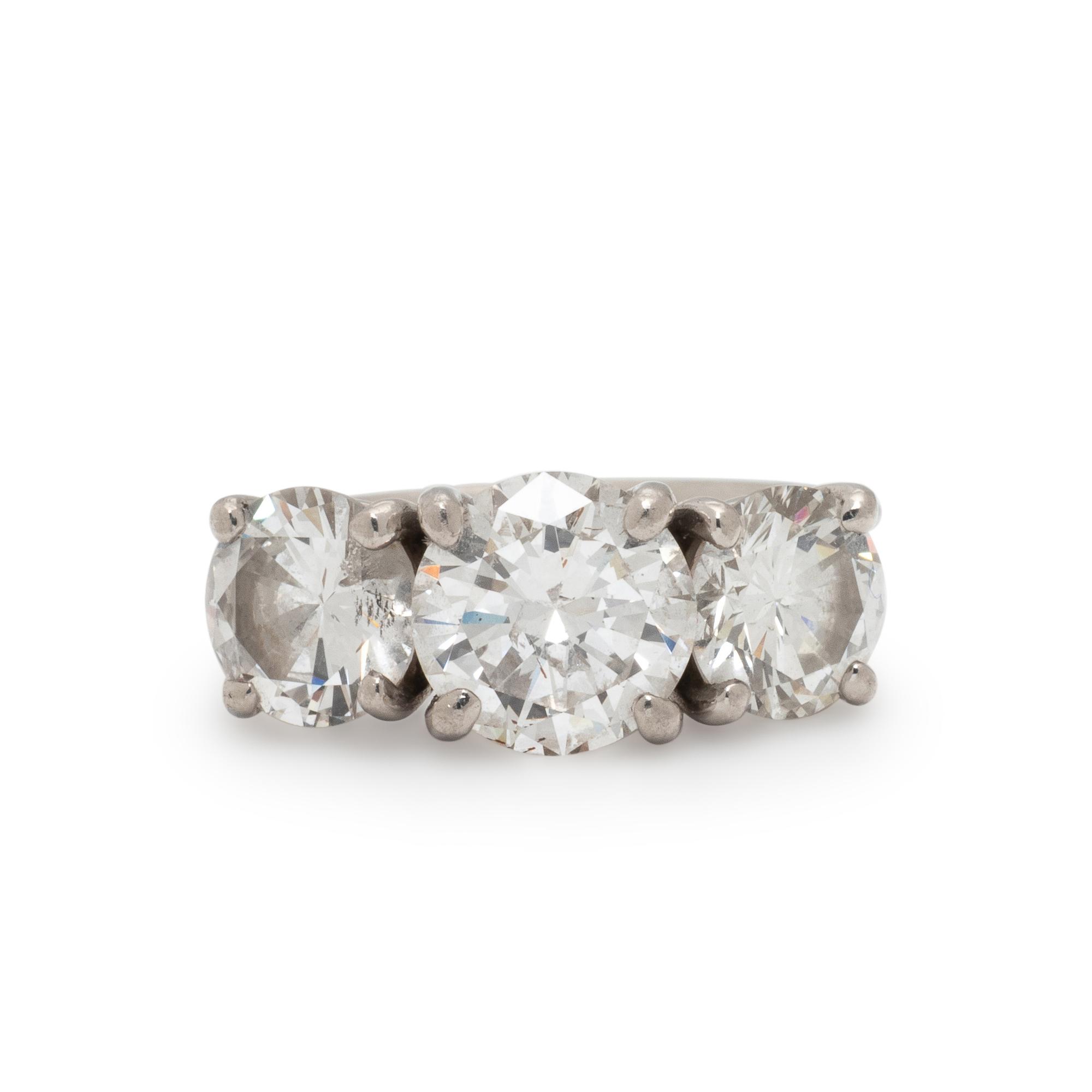 THREE-STONE DIAMOND RING