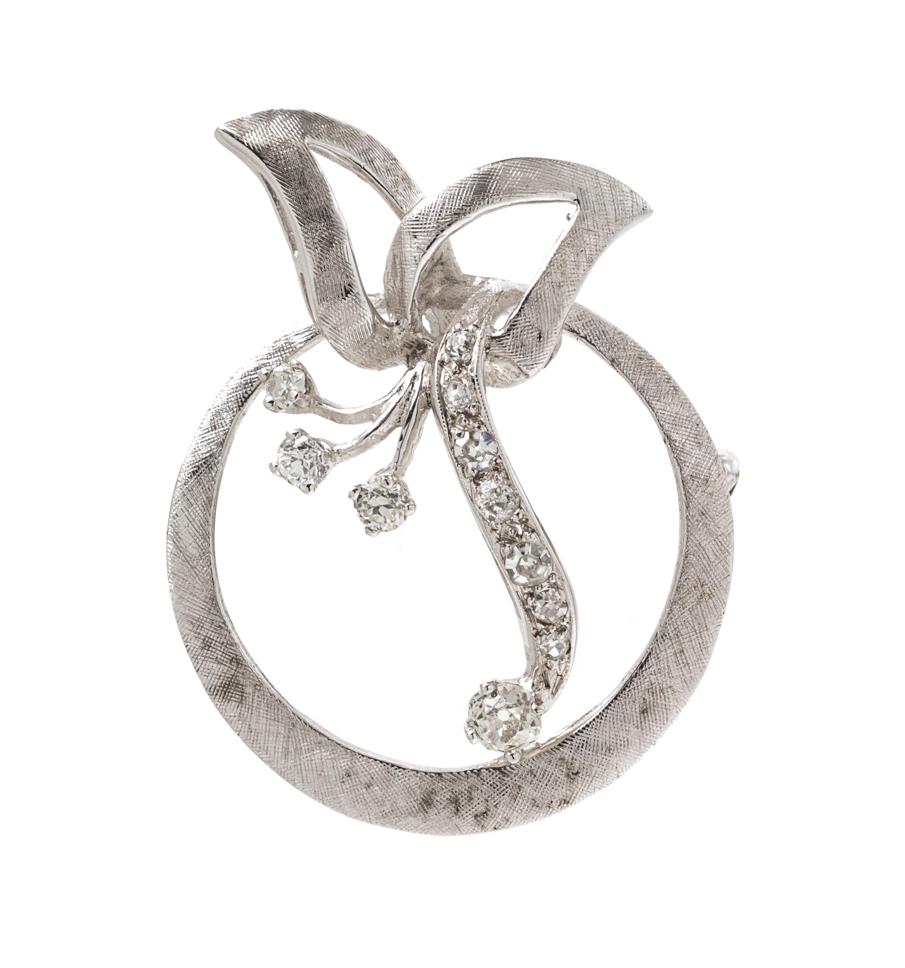 A White Gold and Diamond Brooch, 5.50 dwts.