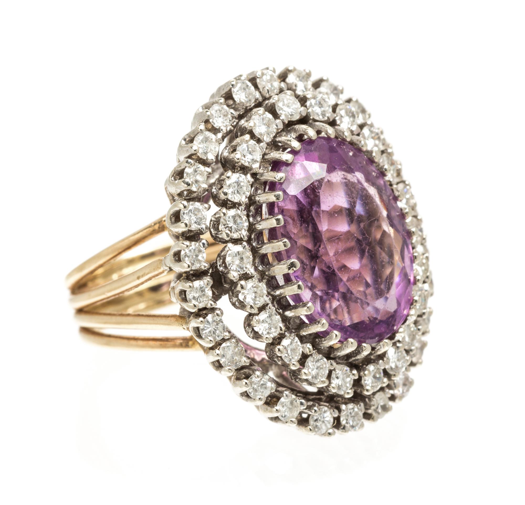 A Two Tone Gold, Amethyst and Diamond Ring, 9.90 dwts.