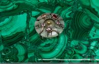 A Group of Five Jeweled Malachite Boxes