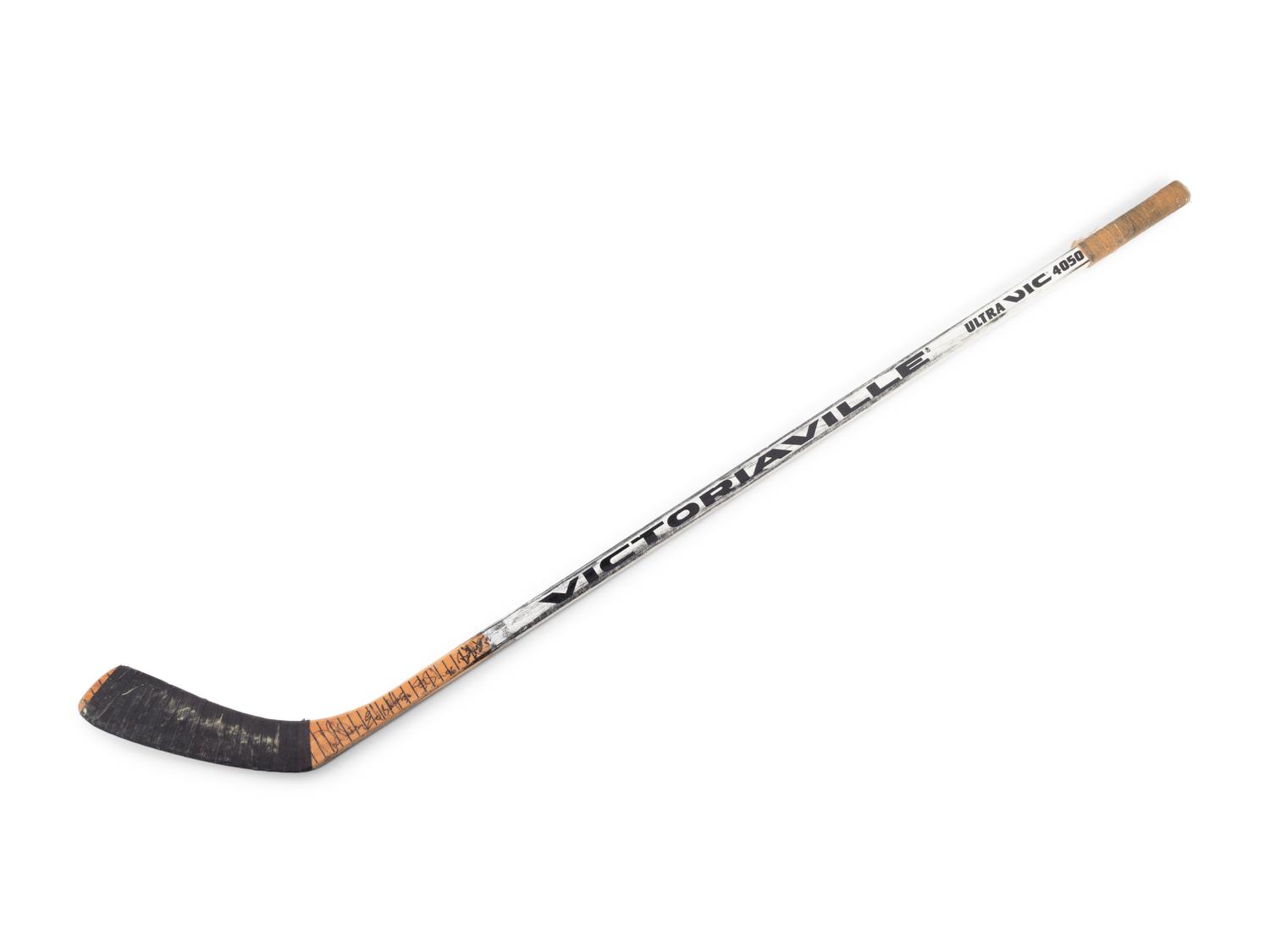 A Brent Sutter Game Used Hockey Stick Signed by Chicago Blackhawks Notables,