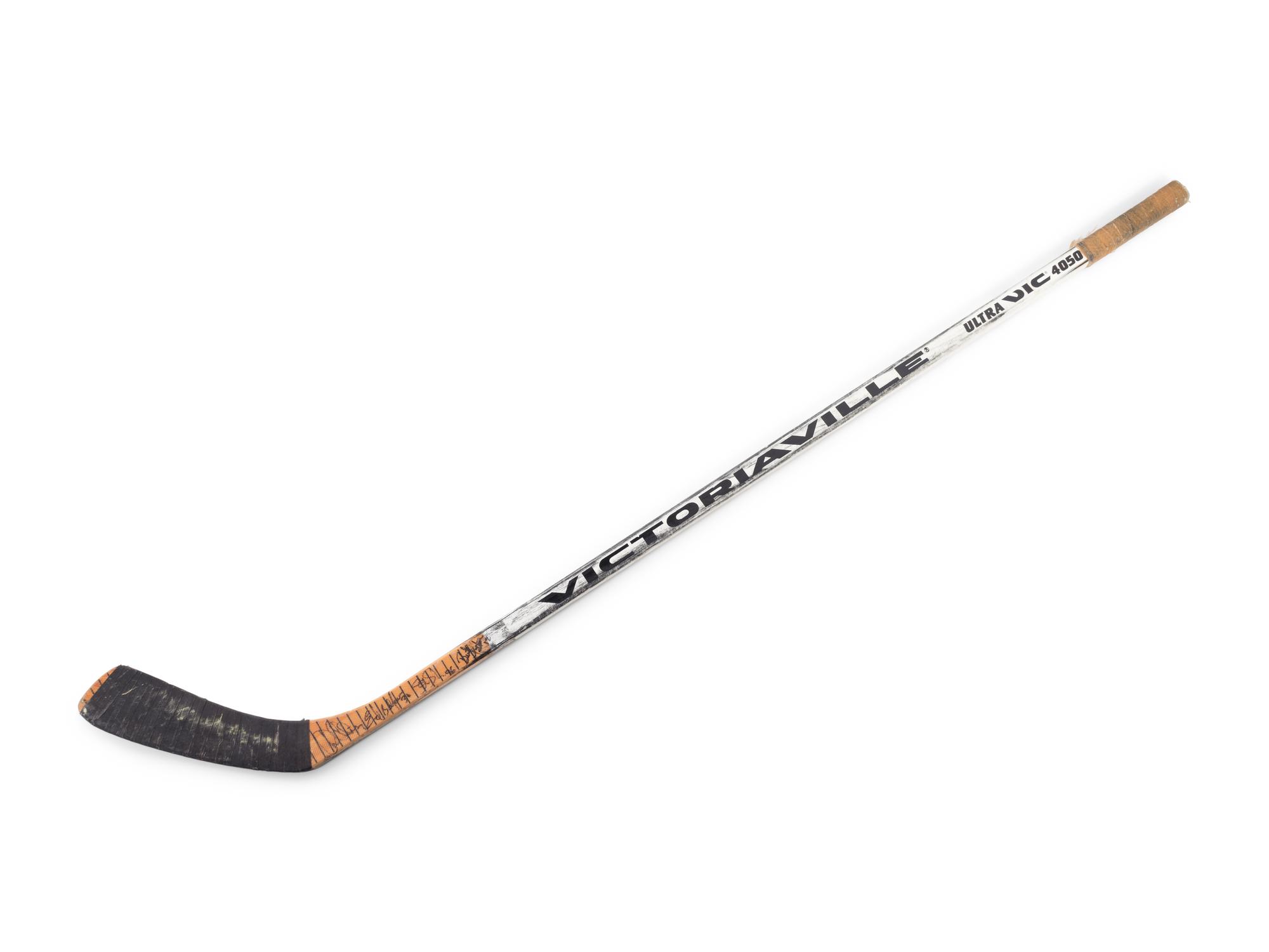A Brent Sutter Game Used Hockey Stick Signed by Chicago Blackhawks Notables,