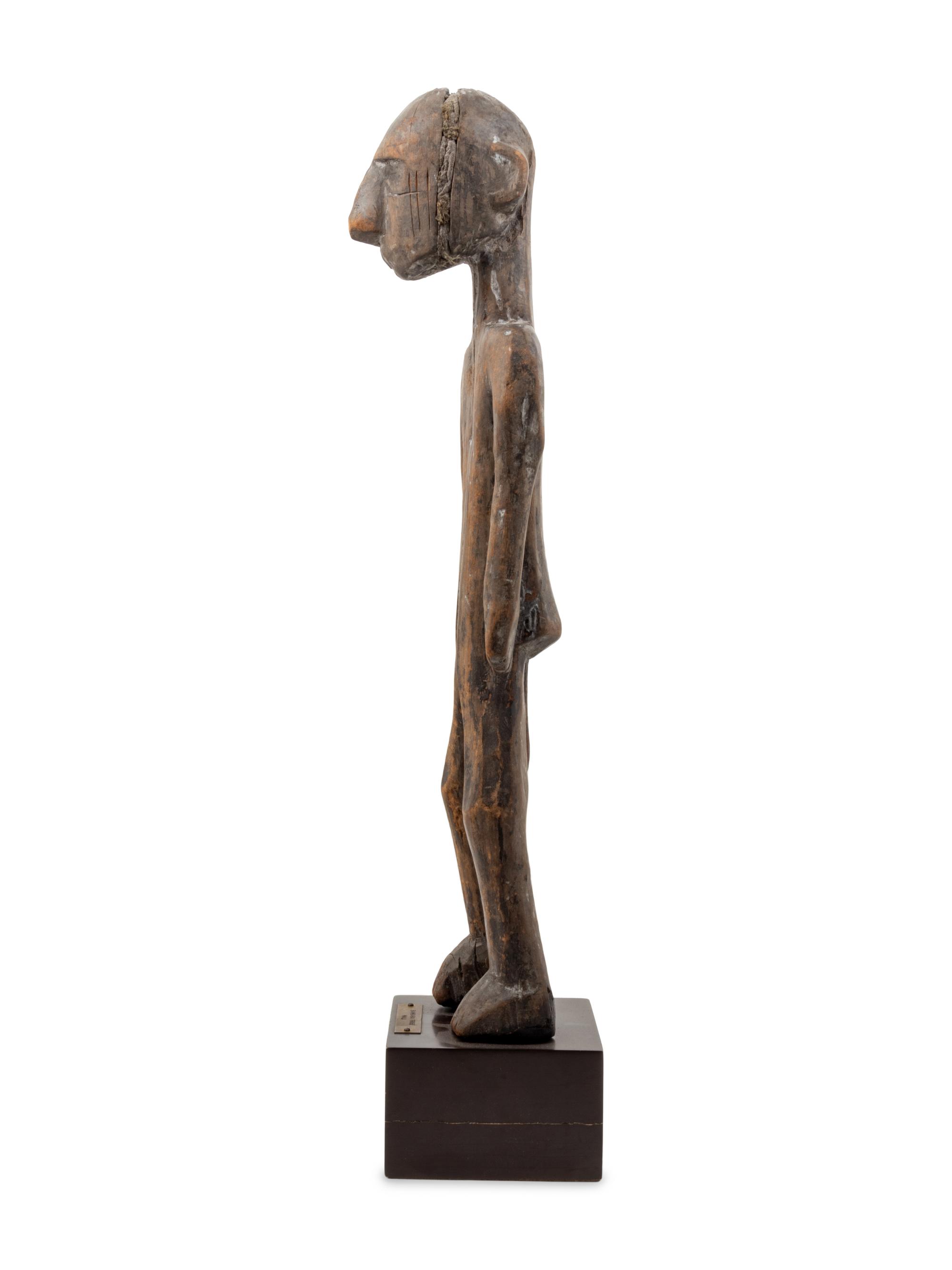A Bambara Carved Wood Figure