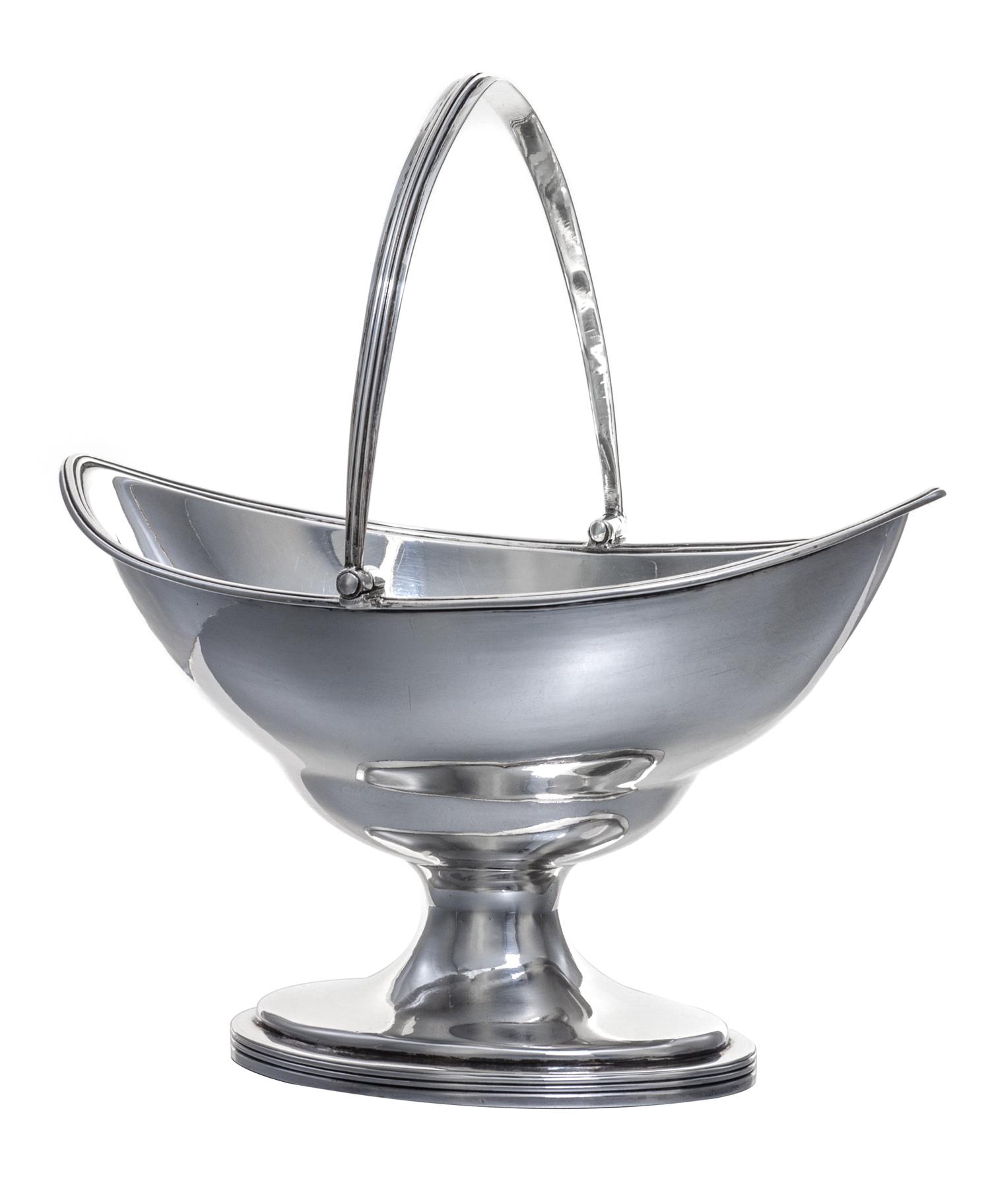 A George III Silver Sugar Basket, Hester Bateman, London, 1790, of oblong form with a reeded edge and a swing handle, raised on a simil
