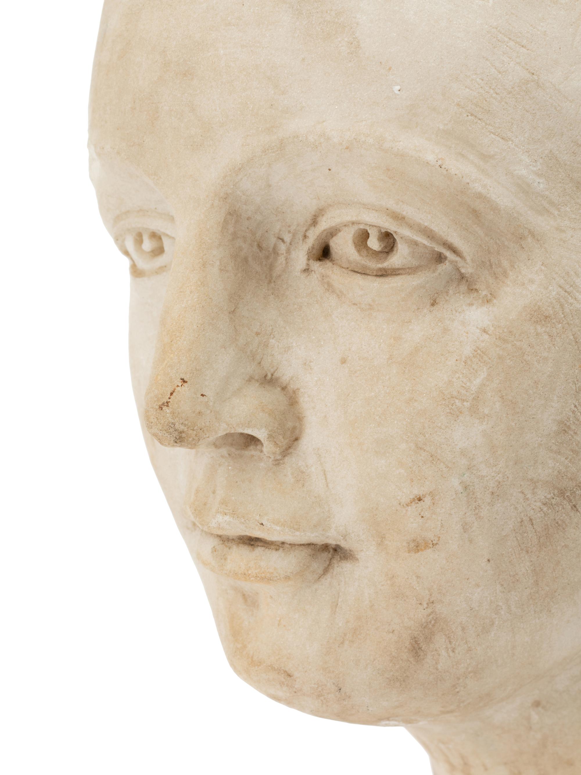 An Italian Marble Head of a Lady on an Iron Base