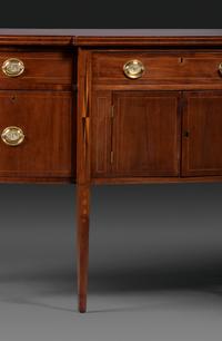 A Federal Inlaid and Figured Mahogany Sideboard