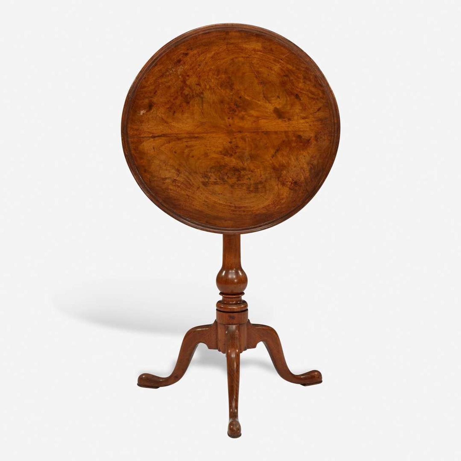 A Queen Anne carved walnut tilt-top candlestand Pennsylvania, circa 1760