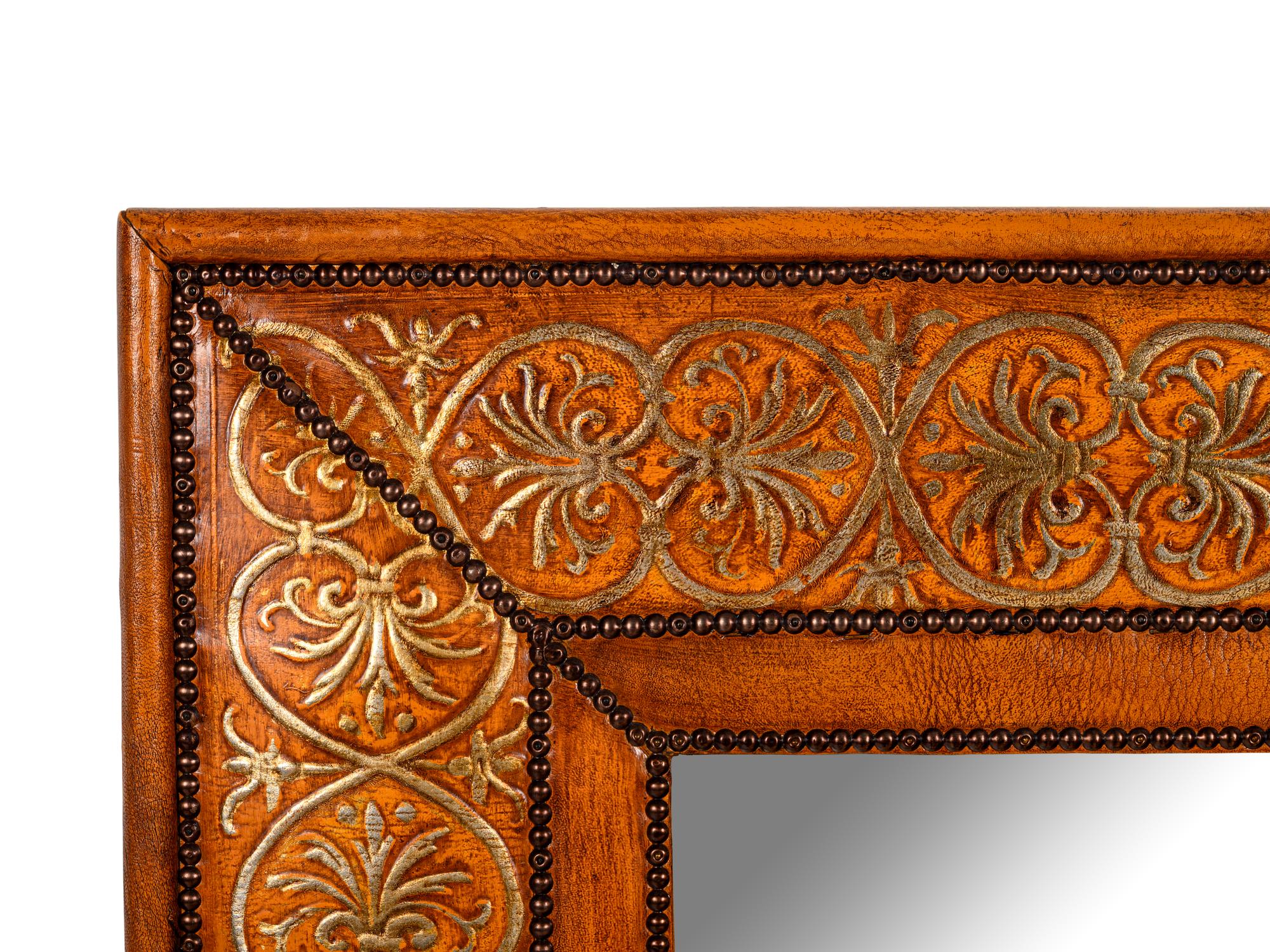 A Gilt Decorated Leather Mirror