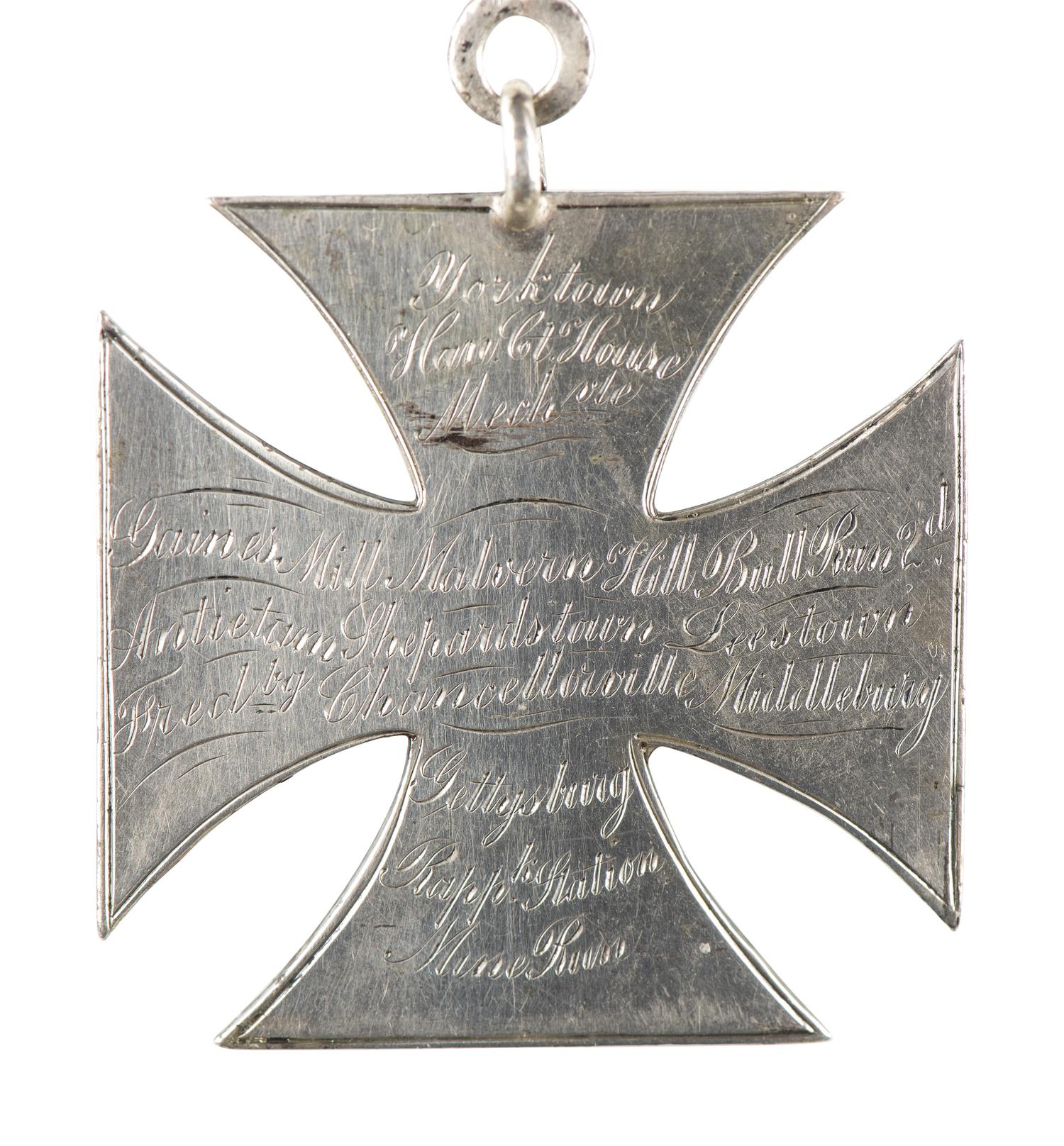 [CIVIL WAR]. Badge identified to Alfred J. Johnson, 1st, 3rd, and 5th Massachusetts Light Artilleries.