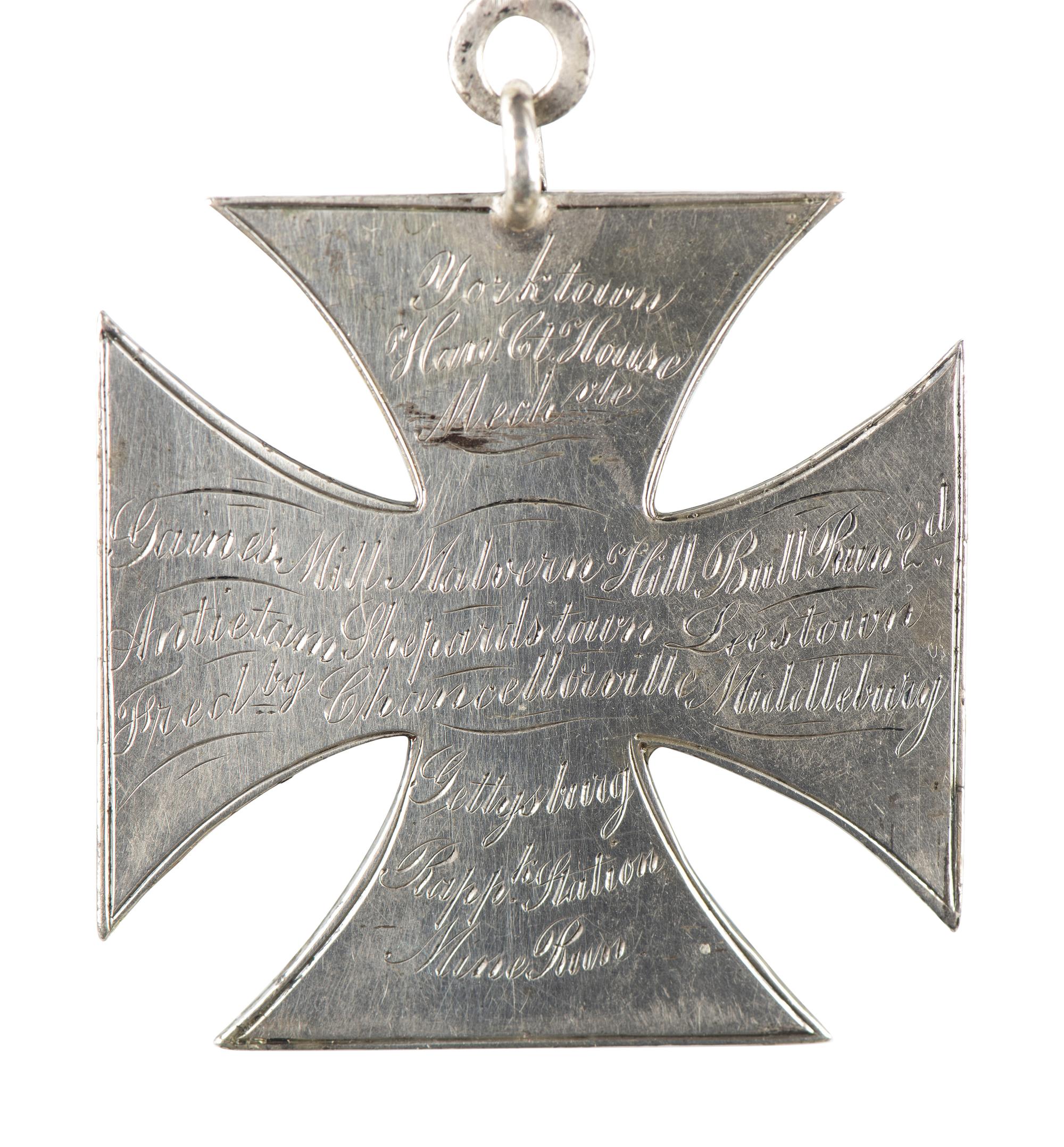 [CIVIL WAR]. Badge identified to Alfred J. Johnson, 1st, 3rd, and 5th Massachusetts Light Artilleries.