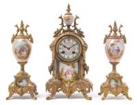 A Sevres Style Porcelain Mounted Gilt Metal Clock Garniture Height of clock 14 inches. — MOVEMENT BY VINCENTI & CIE, PARIS