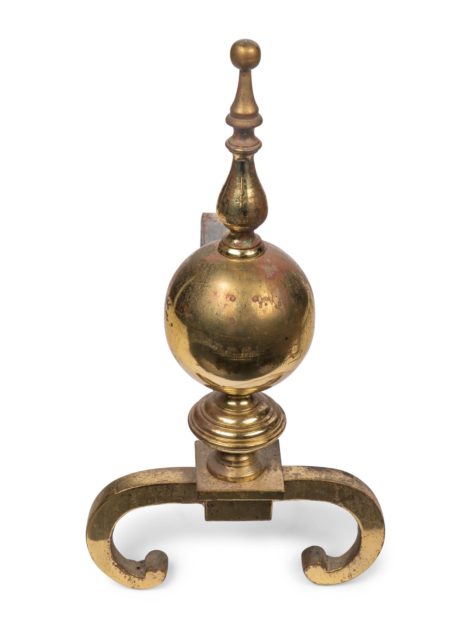 An English Brass Fireplace Fender and Pair of Andirons