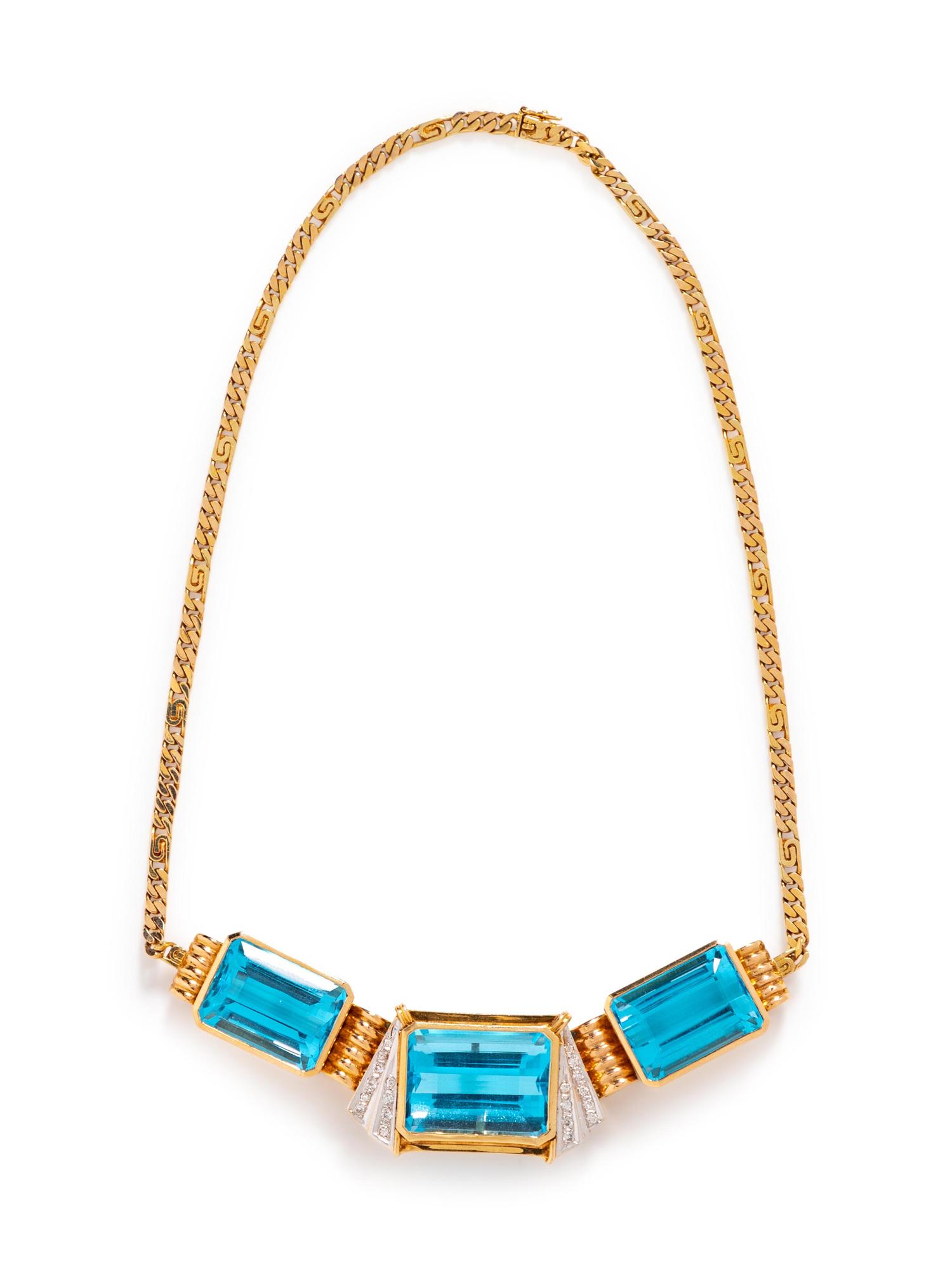 A 14 Karat Yellow Gold and Blue Topaz Necklace,