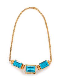 A 14 Karat Yellow Gold and Blue Topaz Necklace,