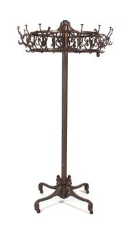 A Cast Iron Coat Rack Height 77 inches.