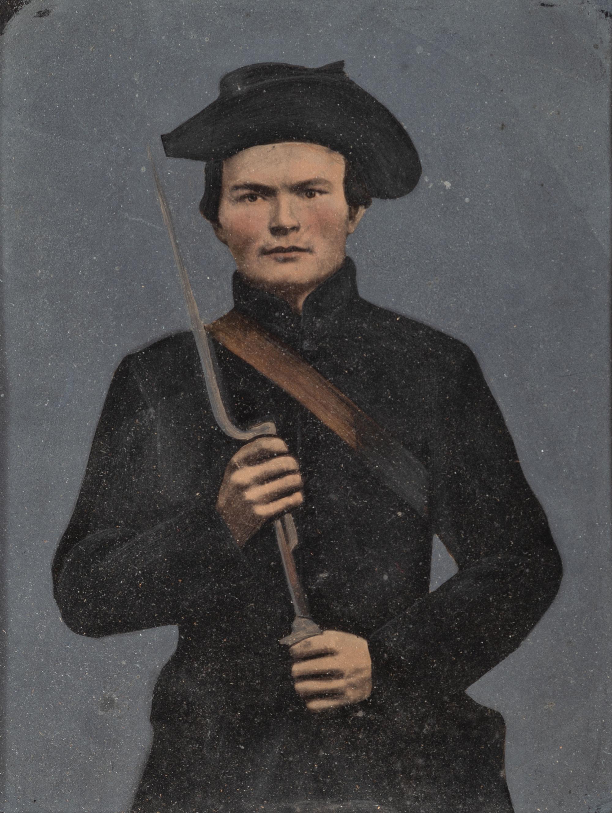 [CIVIL WAR]. Whole plate hand-tinted tintype of a possible Confederate soldier with musket.