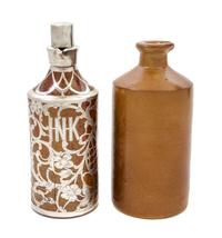 An English Bourne Denby Ceramic Silver Overlay Ink Bottle, retailed by Black, Starr & Frost Height of taller 8 1/4 inches.