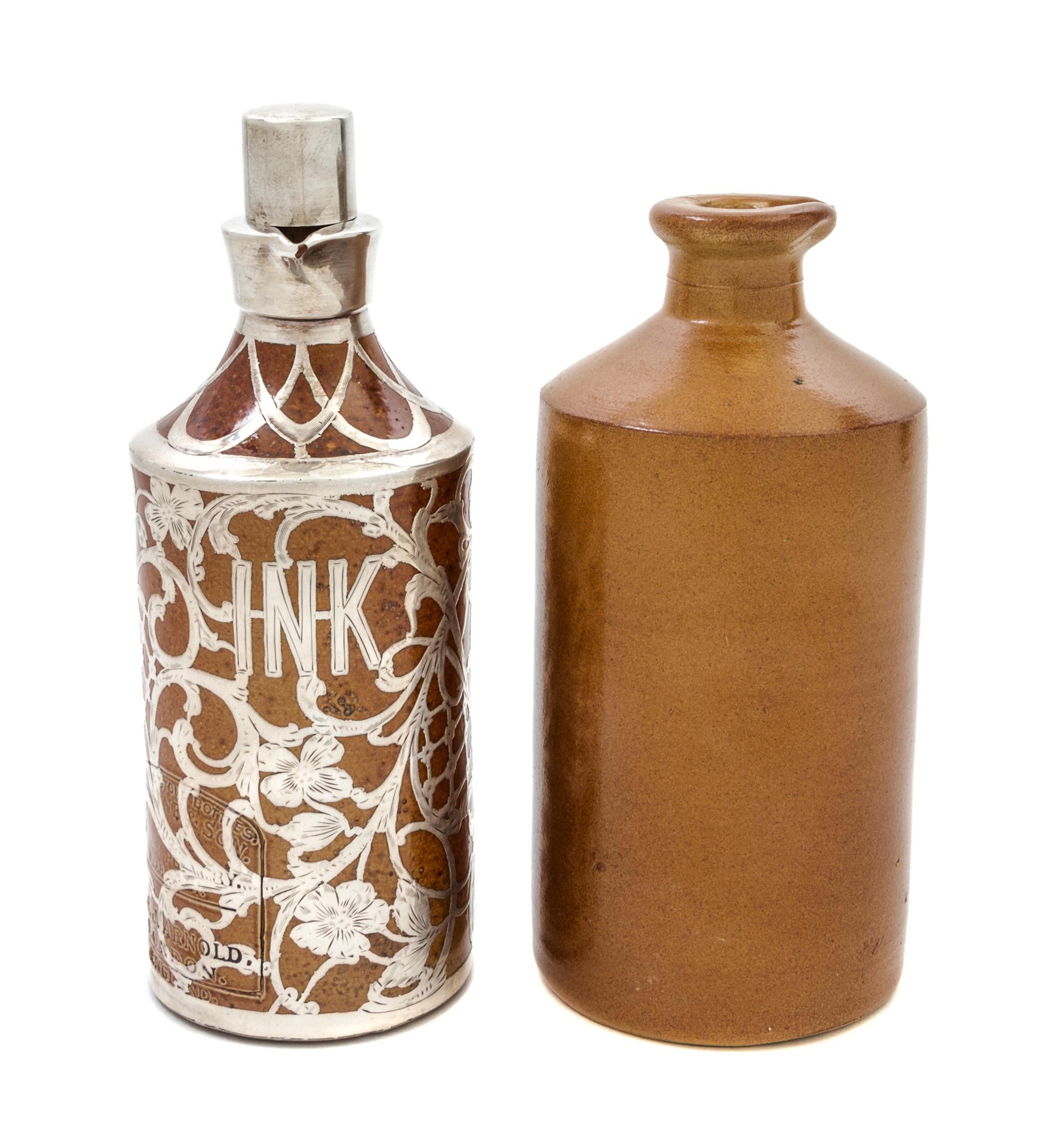 An English Bourne Denby Ceramic Silver Overlay Ink Bottle, retailed by Black, Starr & Frost Height of taller 8 1/4 inches.