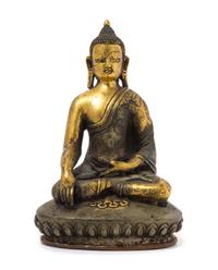 A Sino-Tibetan Gilt Bronze Figure of Seated Buddha Height 5 3/4 inches.
