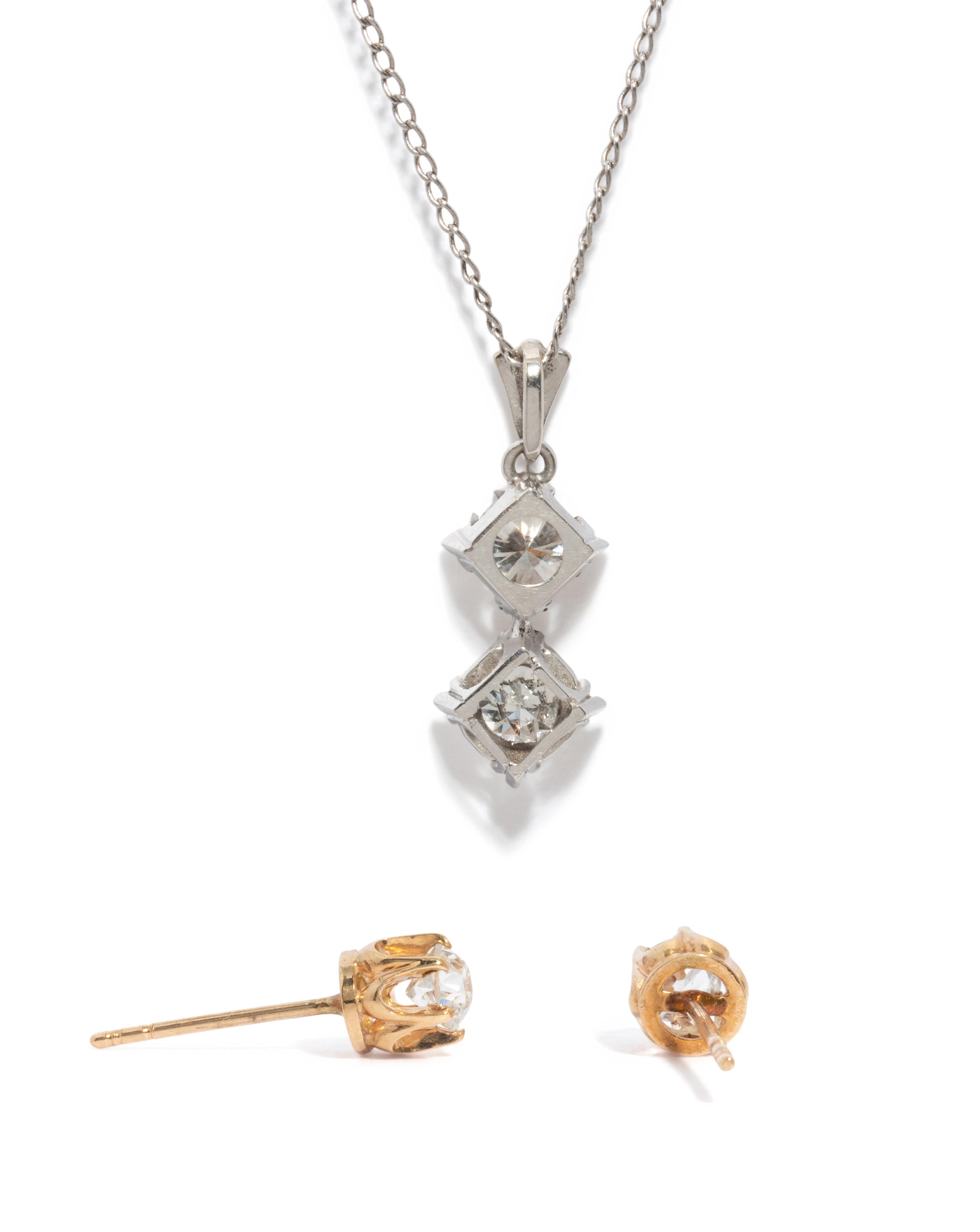 DIAMOND PENDANT NECKLACE AND DIAMOND STUDS