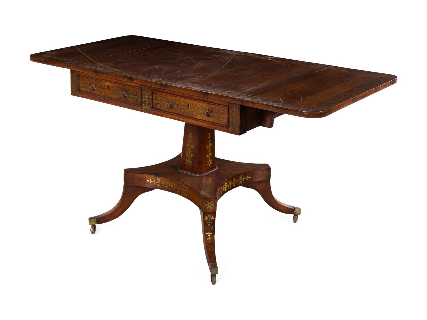 A Regency Brass Inlaid Rosewood Pedestal Sofa Table