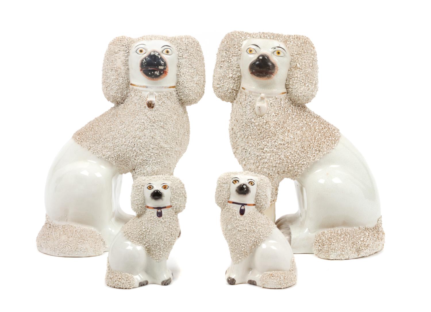 A Group of Four Staffordshire Poodles Height of tallest 9 3/4 inches.