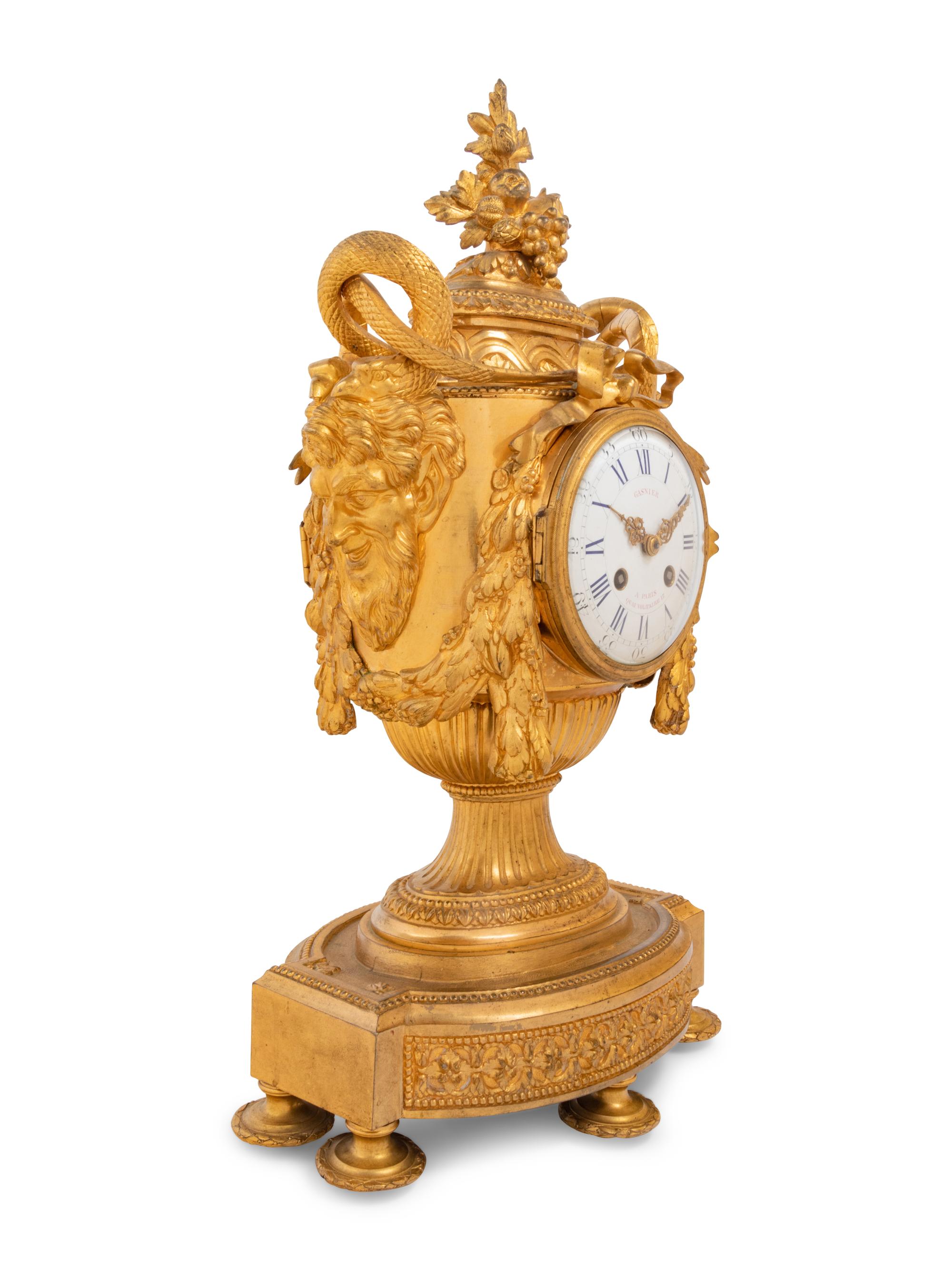 A Louis XVI Style Gilt Bronze Mantel Clock