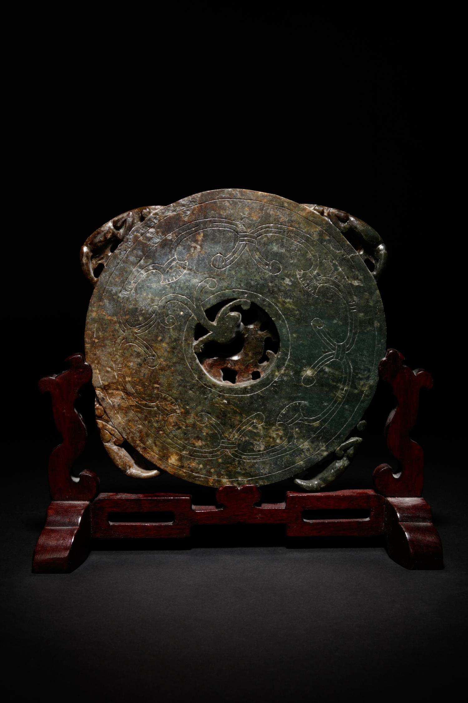 A Carved Jade Bi Disk