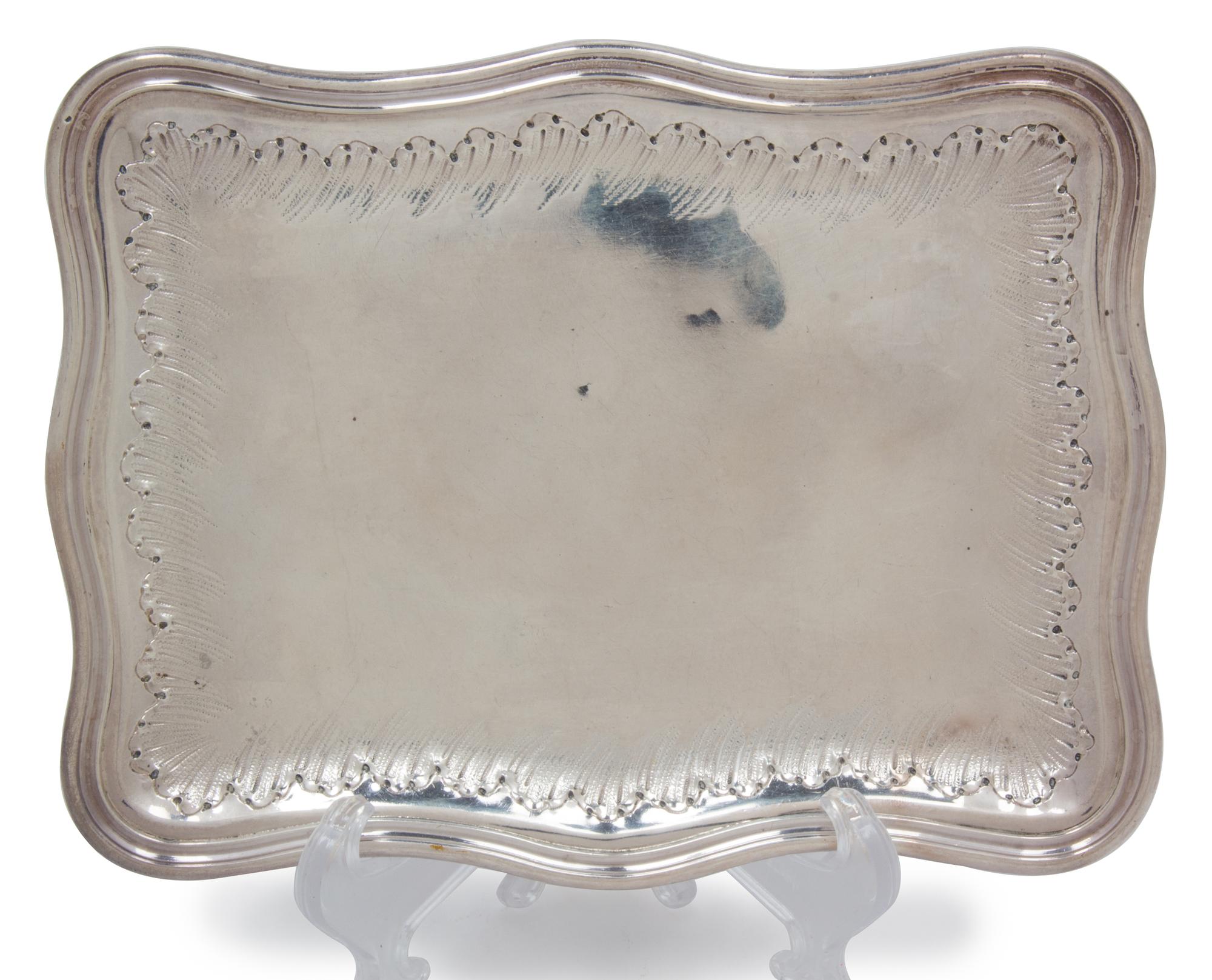 Two George V Silver Articles, , comprising: a castor, London, 1912 a sauce boat, London, 1925