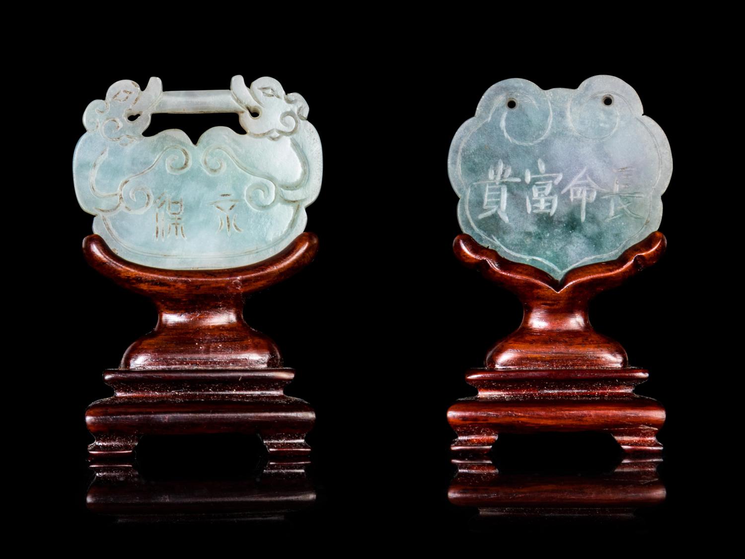 Two Chinese Jadeite Lock-Form Pendants