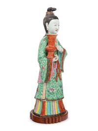 A Chinese Export Figure of a Standing Court Maiden