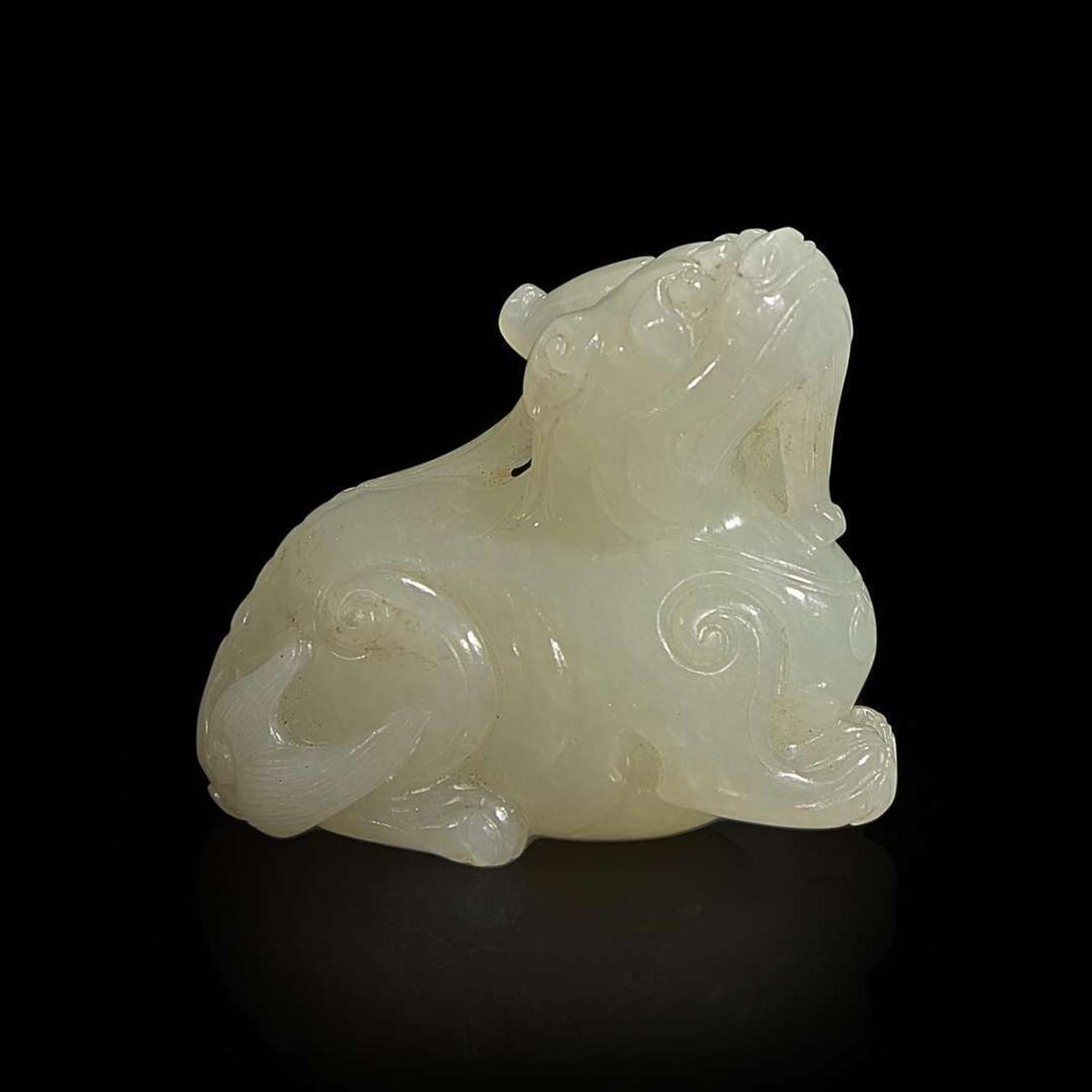 A Chinese carved white jade mythical beast 白玉雕瑞兽 Qing dynasty ?