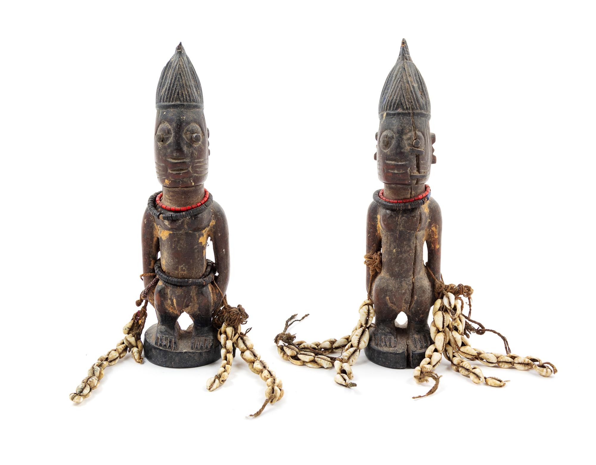 A Pair of Yoruba Twin Ibeji Figures Height 10 1/4 inches. — NIGERIA, PROBABLY MID-20TH CENTURY