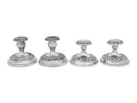Two Pairs of S. Kirk and Son Repousse Silver Candlesticks
