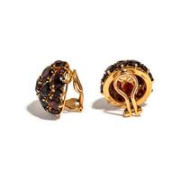 A COLLECTION OF YELLOW GOLD AND GARNET JEWELRY