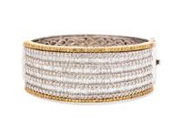 An 18 Karat Bicolor Diamond Bangle,