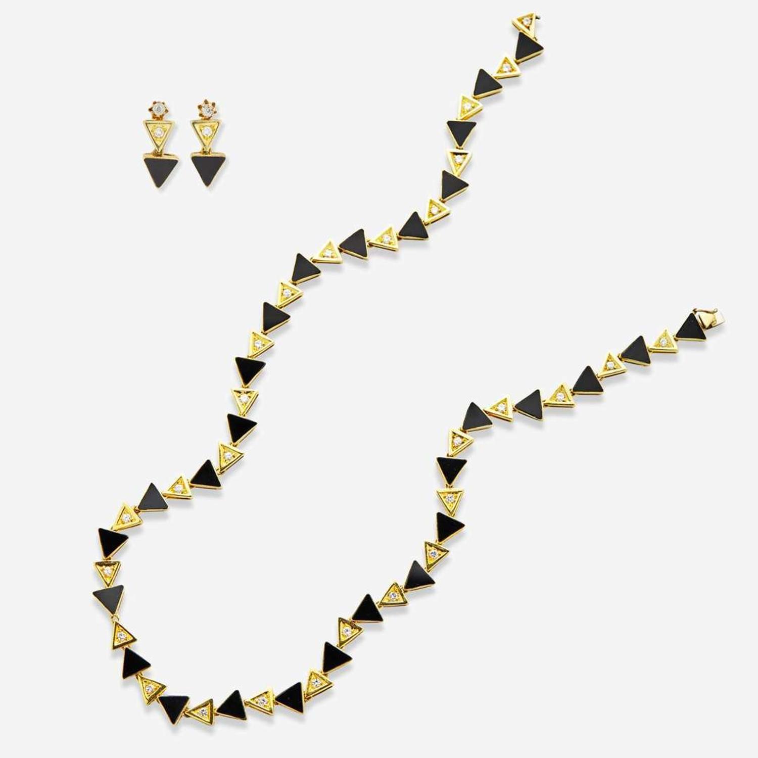 A 14K Yellow Gold, Onyx, and Diamond Necklace