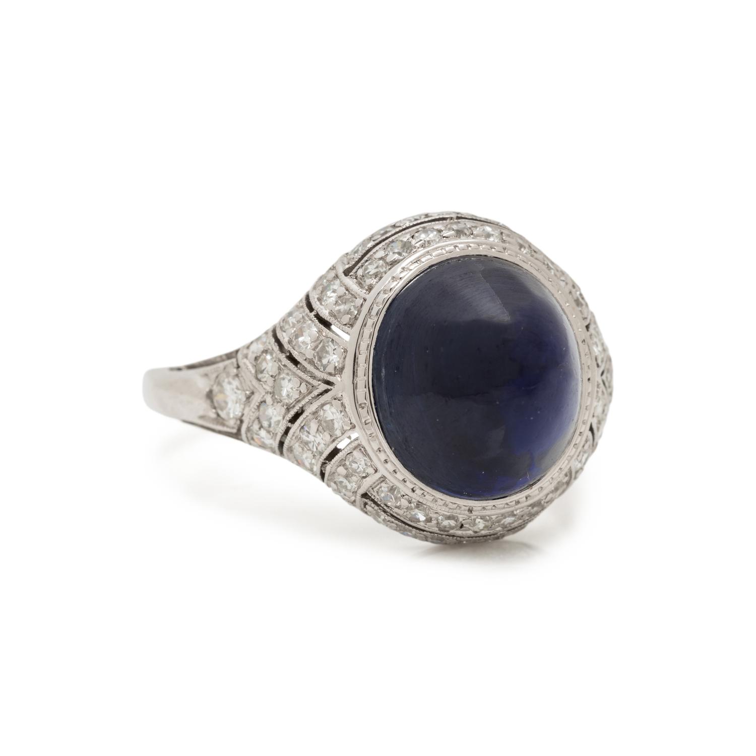 ART DECO, CABOCHON SAPPHIRE AND DIAMOND RING