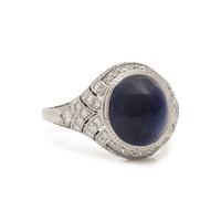 ART DECO, CABOCHON SAPPHIRE AND DIAMOND RING