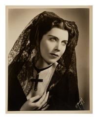 [20TH-CENTURY OPERA SINGERS]. A group of 6 photographs or photographic prints of opera singers from the 1930s, most signed, comprising images of: