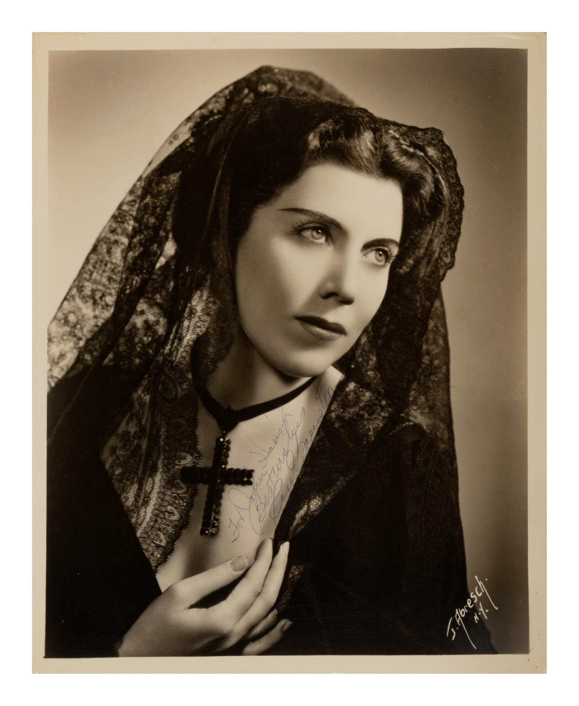 [20TH-CENTURY OPERA SINGERS]. A group of 6 photographs or photographic prints of opera singers from the 1930s, most signed, comprising images of: