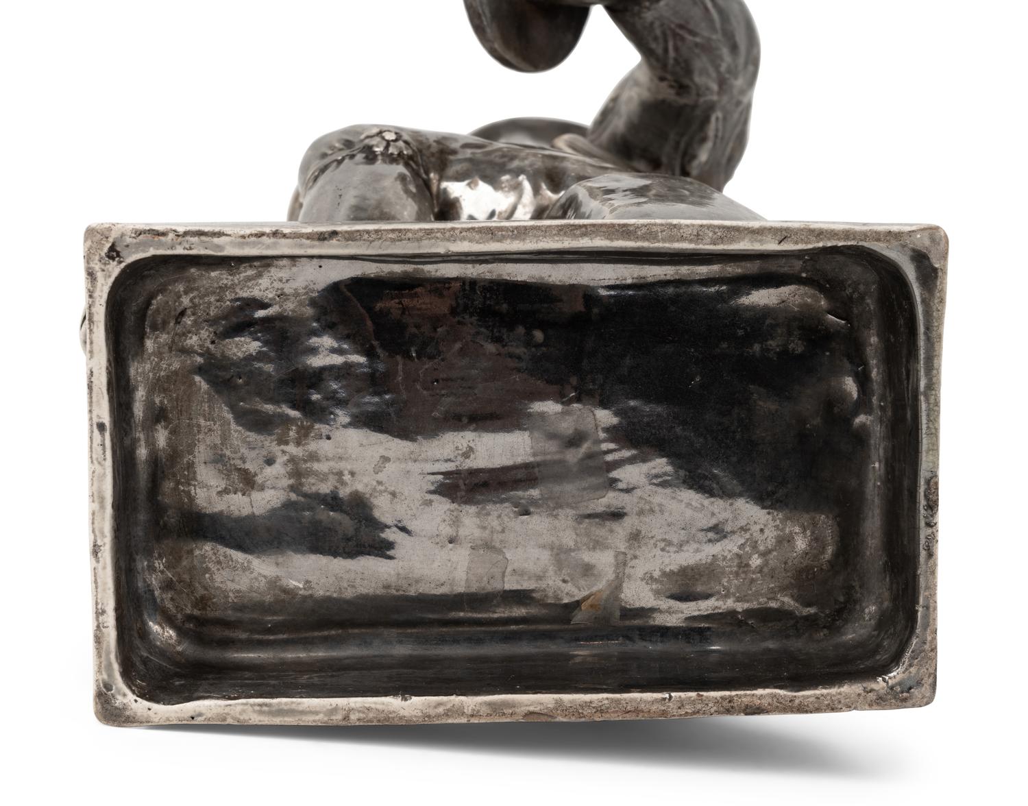 An English Silver Luster Ware Figure