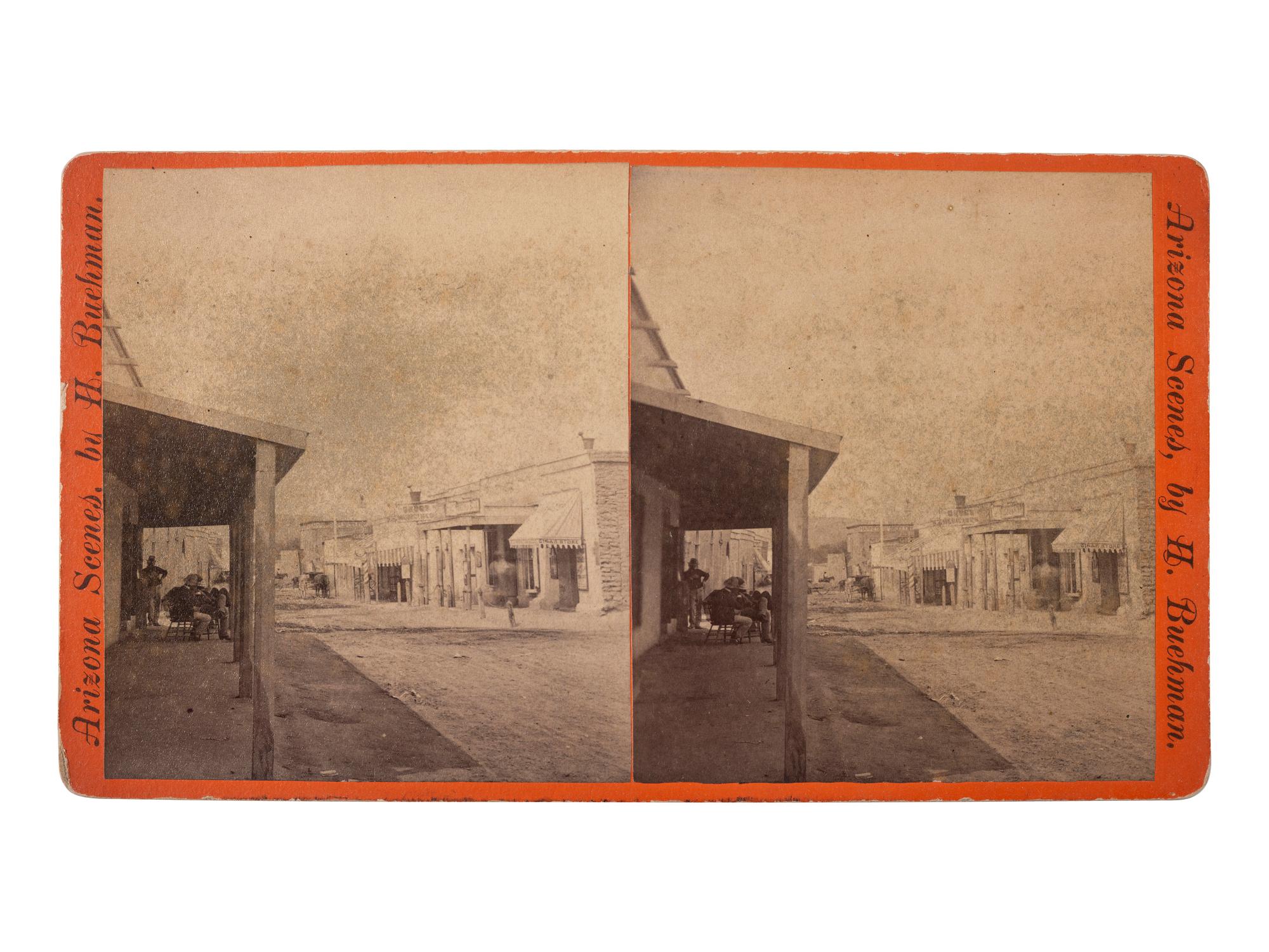 [WESTERN AMERICANA - ARIZONA]. BUEHMAN, Henry (1851-1912), photographer. A group of 2 stereoviews of Tucson, incl. view of Congress Street and horse-drawn ore cart passing through town. Tucson, Arizona Territory, ca 1870s.