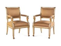 A Pair of Empire Painted and Parcel Gilt Fauteuils