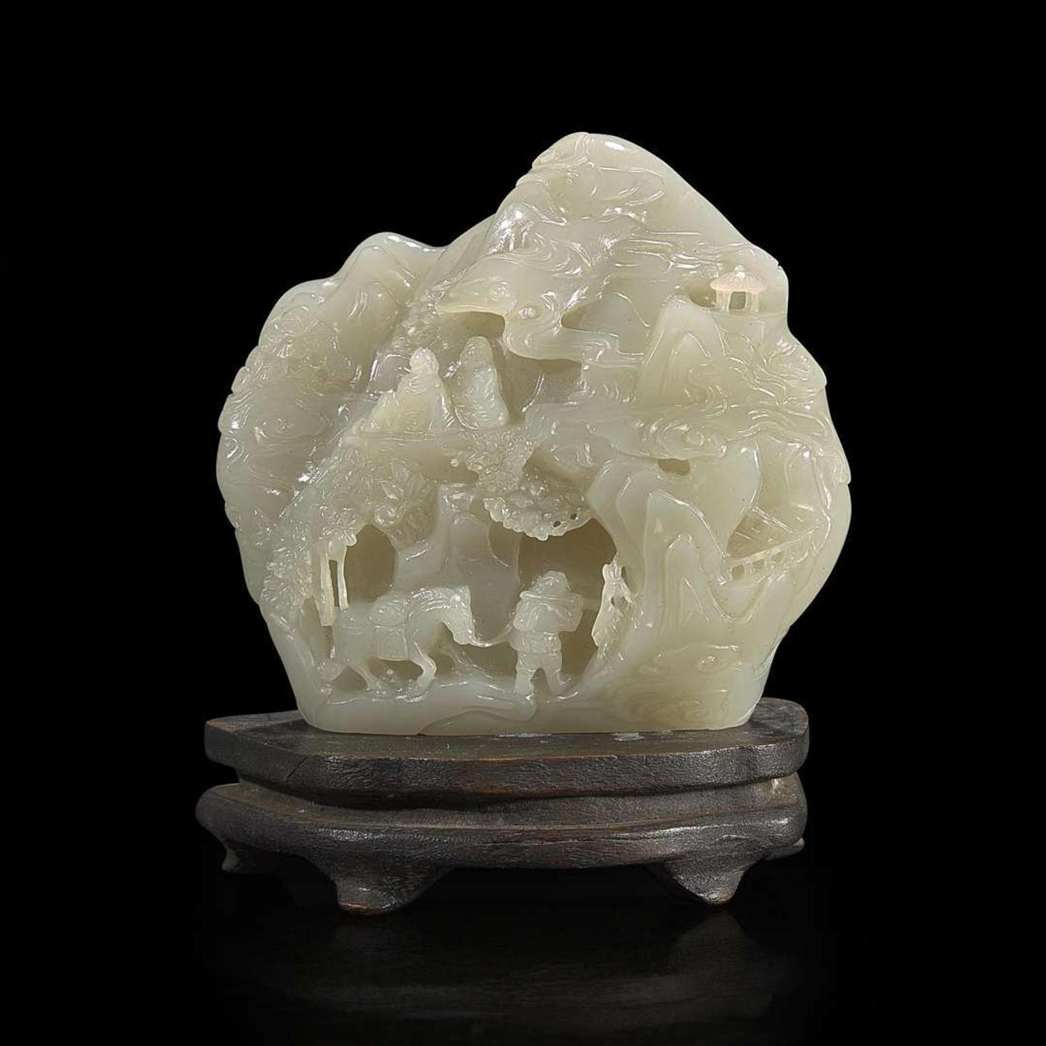 A small Chinese carved celadon-grey jade "mountain" 青灰玉山子 20th century ????